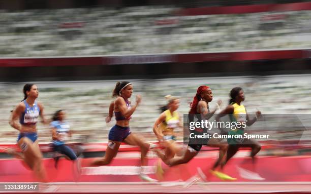 Michelle-Lee Ahye of Team Trinidad And Tobago competes during round one of the Women's 100m heats on day seven of the Tokyo 2020 Olympic Games at...