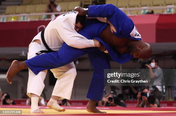 Teddy Riner of Team France and of Tamerlan Bashev of Team ROC compete during the Men’s Judo +100kg Quarterfinal on day seven of the Tokyo 2020...