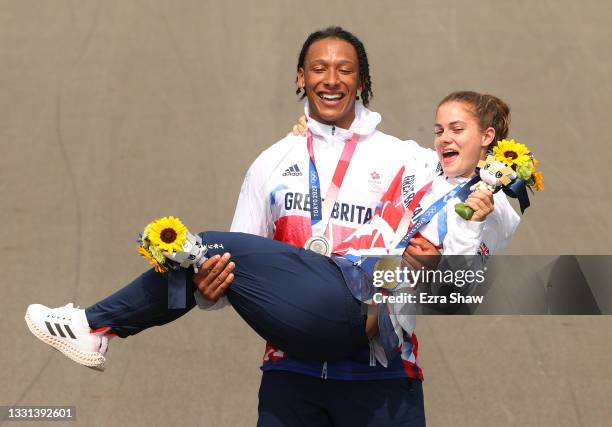 Silver medalist Kye Whyte and gold medalist Bethany Shriever of Team Great Britain pose for a photograph while celebrate at the medal ceremony after...