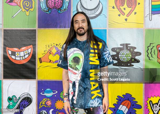 Steve Aoki poses backstage on day 1 of Lollapalooza at Grant Park on July 29, 2021 in Chicago, Illinois.