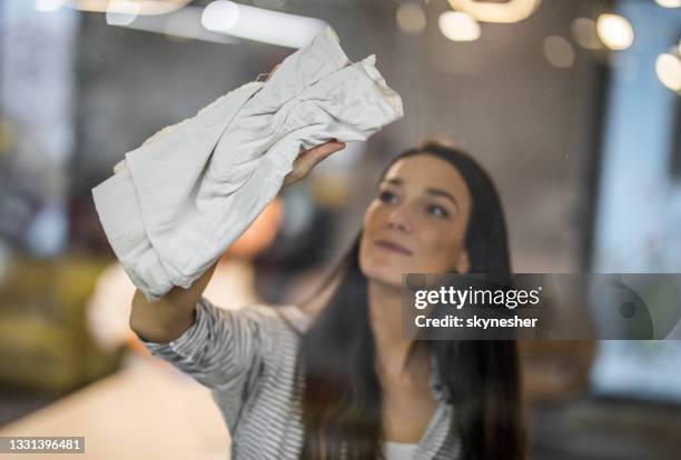 cleaning glass in the office! - window cleaning stock pictures, royalty-free photos & images