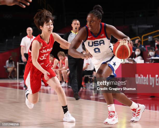 Chelsea Gray of Team United States drives to the basket against Saori Miyazaki of Team Japan during the second half of a Women's...
