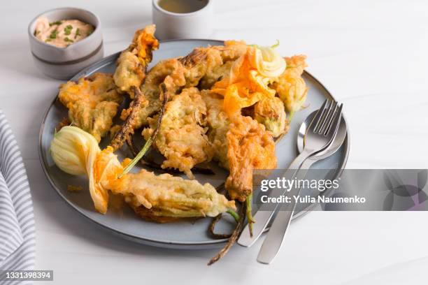 fried squash blossoms - deep fry stock pictures, royalty-free photos & images