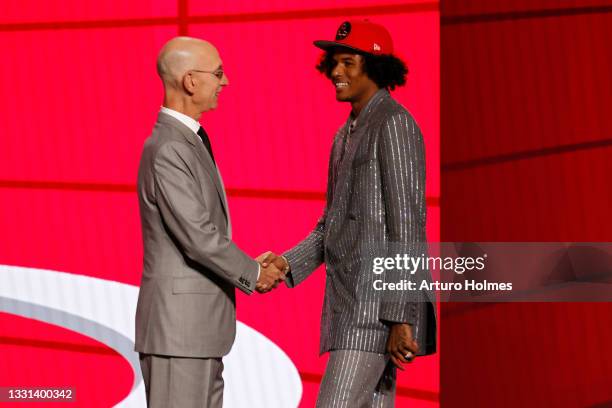 Commissioner Adam Silver and Jalen Green shake hands after Green was drafted by the Houston Rockets during the 2021 NBA Draft at the Barclays Center...