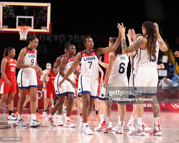 Ariel Atkins of Team United States celebrates a win against Japan with teammates following a Women's Basketball Preliminary Round Group B game on day...