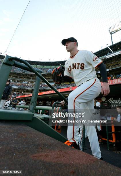 Anthony DeSclafani of the San Francisco Giants walks out of the dugout onto the field to start the game against the Los Angeles Dodgers at Oracle...