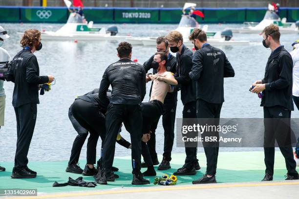 Mens 8 rower Thomas Mackintosh of New Zealand, mens 8 rower Hamish Bond of New Zealand, mens 8 rower Tom Murray of New Zealand, mens 8 rower Michael...