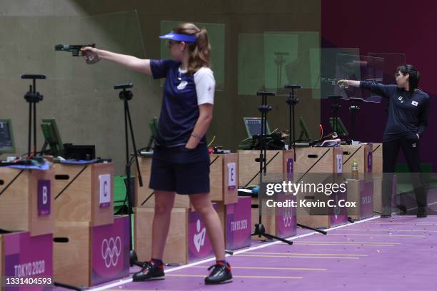 Gold Medalist Vitalina Batsarashkina and Silver Medalist Minjung Kim of Team South Korea compete in 25m Pistol Women's Finals on day seven of the...