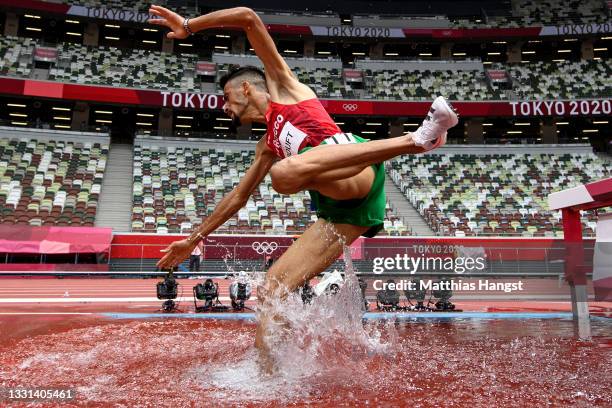 Mohamed Tindouft of Team Morocco competes during round one of the Men's 3000m Steeplechase heats on day seven of the Tokyo 2020 Olympic Games at...