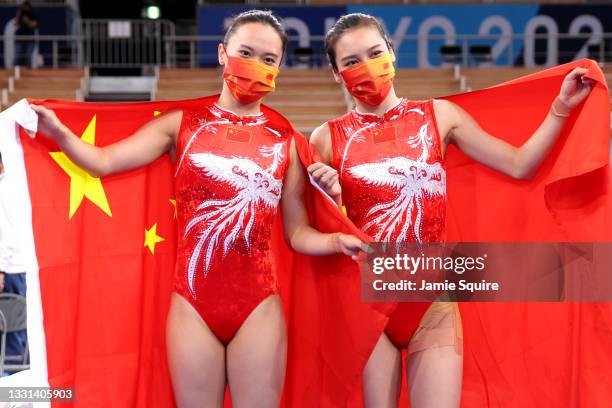 Xueying Zhu and Lingling Liu of Team China pose after winning the gold and silver medals, respectively, during the Women's Trampoline Final on day...