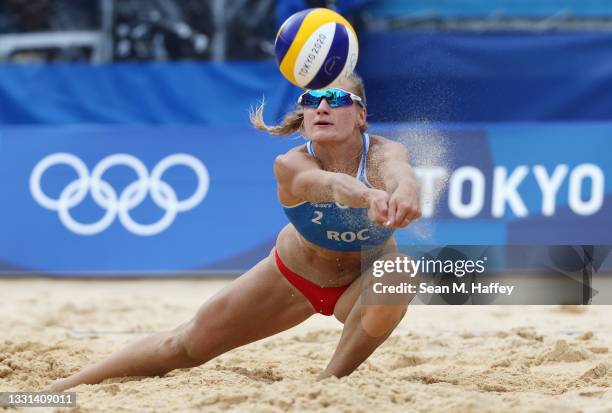 Svetlana Kholomina of Team ROC competes against Team Australia during the Women's Preliminary - Pool E beach volleyball on day seven of the Tokyo...