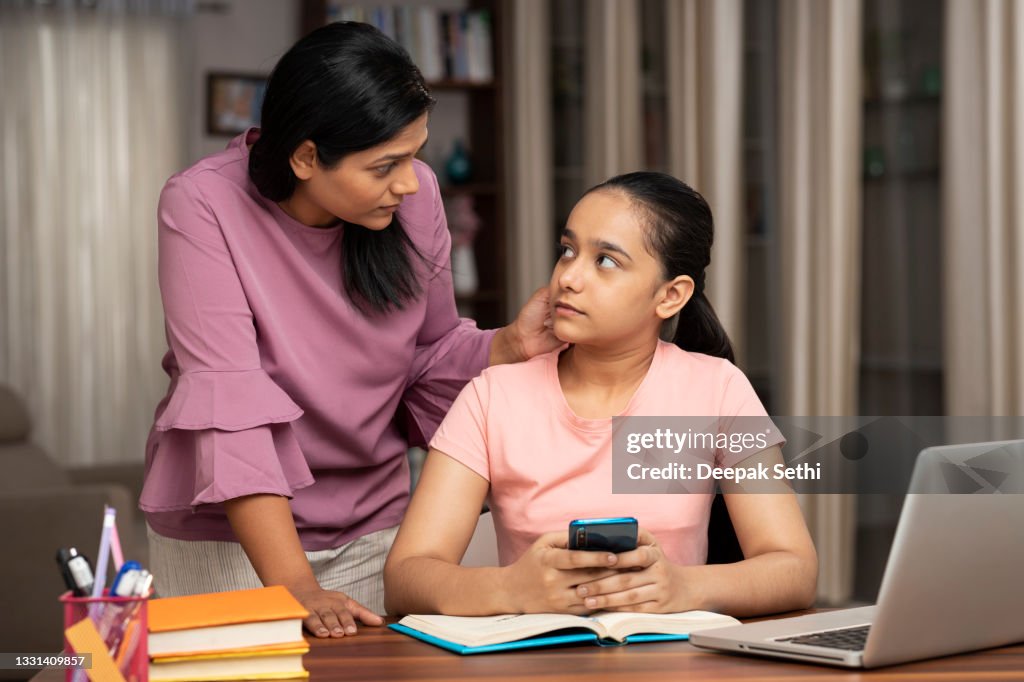 Mother Catches Daughter Using Phone while studying
