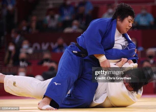 Akira Sone of Team Japan and Iryna Kindzerska of Team Azerbaijan compete during the Women’s Judo +78kg Semifinal of Table B on day seven of the Tokyo...