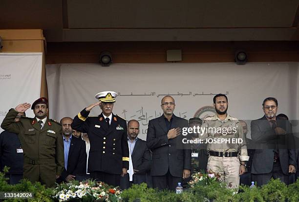 Chief of Tripoli's Military Council Abdelhakim Belhaj attends a military parade organised by the council at the capital's hippodrome on November 17,...