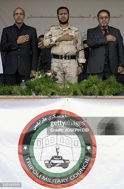 Chief of Tripoli's Military Council Abdelhakim Belhaj attends a military parade organised by the council at the capital's hippodrome on November 17,...
