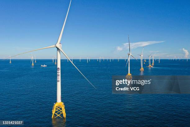 Aerial view of the construction site of an offshore wind farm, invested by China Three Gorges Renewables Co., Ltd, on July 15, 2021 in Yangjiang,...