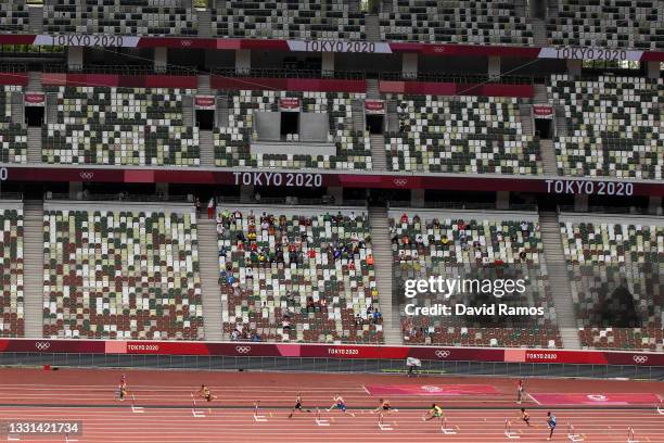 Athletes compete during round one of the Men's 400m hurdles heats on day seven of the Tokyo 2020 Olympic Games at Olympic Stadium on July 30, 2021 in...