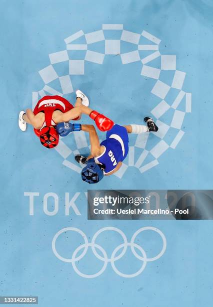 Esra Yildiz of Team Turkey exchanges punches with Dayana Erika Iohanna Sanchez of Team Argentina during the Women's Light on day seven of the Tokyo...