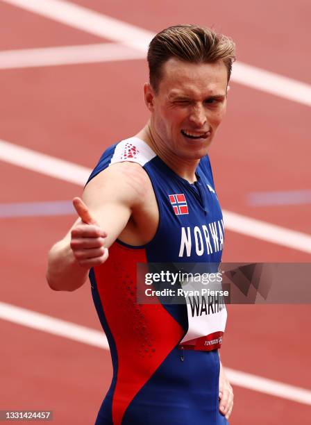 Karsten Warholm of Team Norway reacts after competing during round one of the Men's 400m hurdles heats on day seven of the Tokyo 2020 Olympic Games...