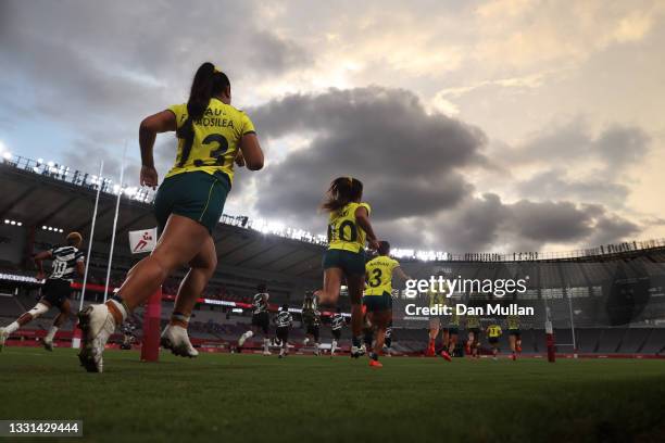 Team Australia take to the field in the Women’s Quarter Final match between Team Fiji and Team Australia during the Rugby Sevens on day seven of the...