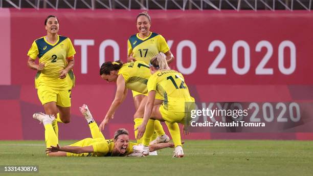 Alanna Kennedy of Team Australia celebrates after scoring their side's first goal during the Women's Quarter Final match between Great Britain and...