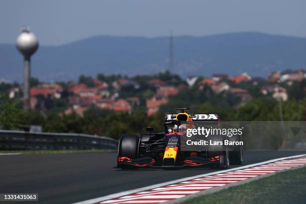 Max Verstappen of the Netherlands driving the Red Bull Racing RB16B Honda during practice ahead of the F1 Grand Prix of Hungary at Hungaroring on...