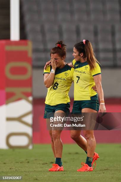 Madison Ashby and Charlotte Caslick of Team Australia look dejected at full time in the Women’s Quarter Final match between Team Fiji and Team...