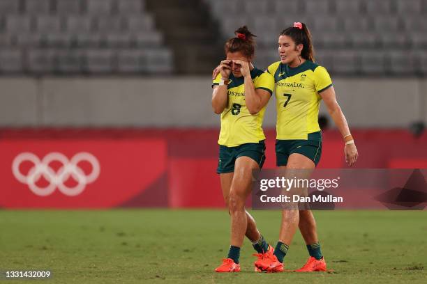 Madison Ashby and Charlotte Caslick of Team Australia look dejected at full time in the Women’s Quarter Final match between Team Fiji and Team...