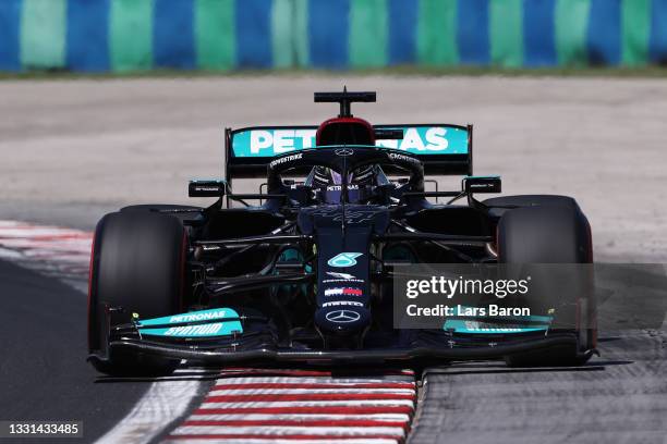 Lewis Hamilton of Great Britain driving the Mercedes AMG Petronas F1 Team Mercedes W12 during practice ahead of the F1 Grand Prix of Hungary at...