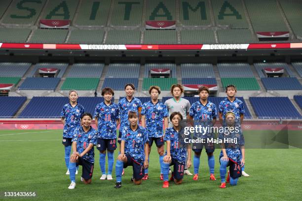 Players of Team Japan pose for a team photograph prior to the Women's Quarter Final match between Sweden and Japan on day seven of the Tokyo 2020...