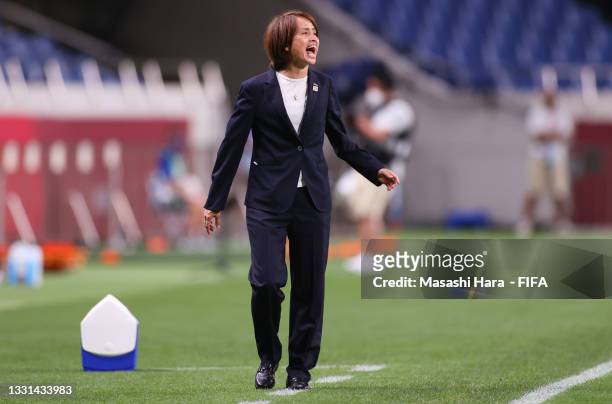 Asako Takakura, Head Coach of Team Japan reacts during the Women's Quarter Final match between Sweden and Japan on day seven of the Tokyo 2020...
