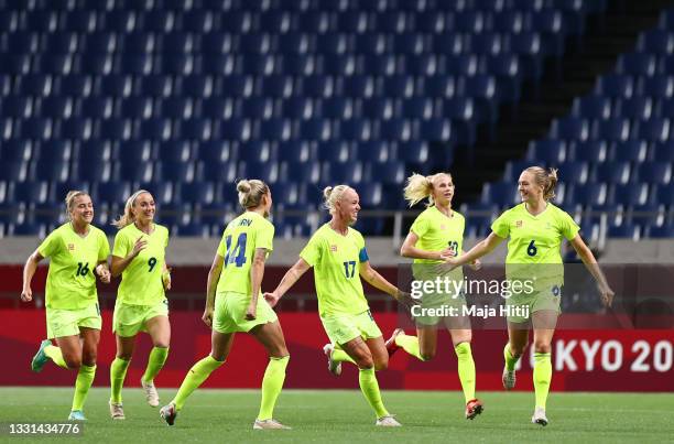 Magdalena Eriksson of Team Sweden celebrates with teammates Filippa Angeldal, Kosovare Asllani, Caroline Seger and Sofia Jakobsson after scoring...