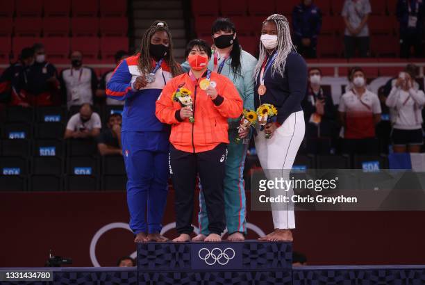 Silver medalist Idalys Ortiz of Team Cuba, gold Akira Sone of Team Japan, bronze medalist A Iryna Kindzerska of Team Azerbaijan and bronze medalist...