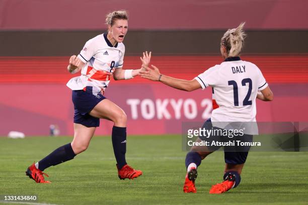 Ellen White of Team Great Britain celebrates with Rachel Daly after scoring their side's first goal during the Women's Quarter Final match between...