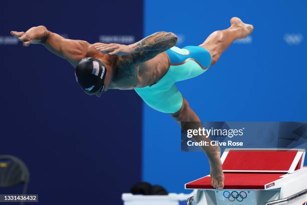 Caeleb Dressel of Team United States competes in the Men's 50m Freestyle heats on day seven of the Tokyo 2020 Olympic Games at Tokyo Aquatics Centre...