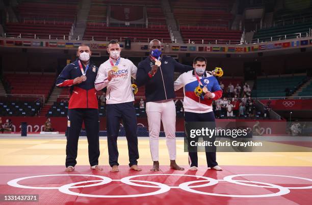 Silver medalist Guram Tushishvili of Team Georgia, gold medalist Lukas Krpalek of Team Czech Republic, bronze medalist B Tamerlan Bashev of Team ROC...