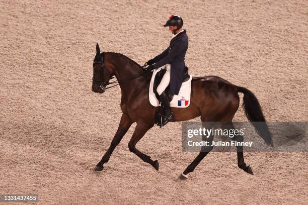 Nicolas Touzaint of Team France riding Absolut Gold competes in the Eventing Dressage Team and Individual Day 1 - Session 2 on day seven of the Tokyo...