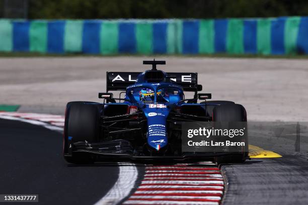 Fernando Alonso of Spain driving the Alpine A521 Renault during practice ahead of the F1 Grand Prix of Hungary at Hungaroring on July 30, 2021 in...