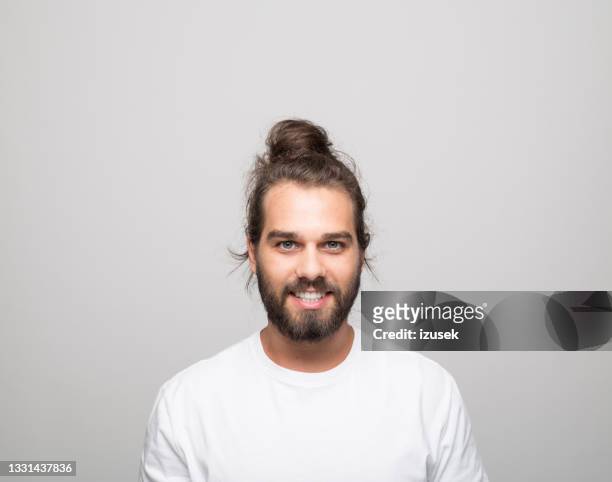 headshot of happy young man - long hair stock pictures, royalty-free photos & images