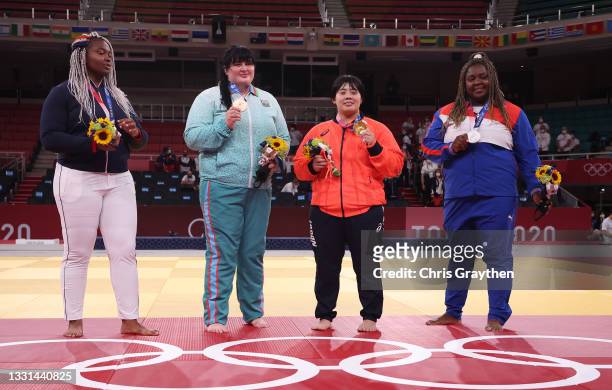 Bronze medalist B Romane Dicko of Team France, gold medalist Akira Sone of Team Japan, bronze medalist A Iryna Kindzerska of Team Azerbaijan and...