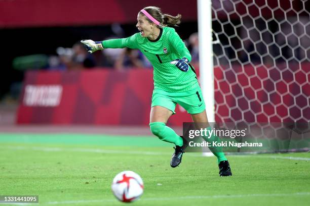 Stephanie Labbe of Team Canada celebrates victory after saving the Team Brazil fifth penalty taken by Rafaelle in a penalty shoot out during the...