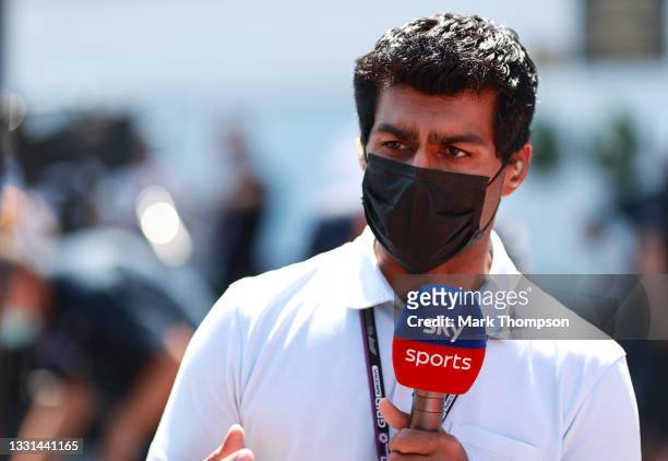 Sky Sports F1 pundit Karun Chandhok talks in the Paddock during practice ahead of the F1 Grand Prix of Hungary at Hungaroring on July 30, 2021 in...
