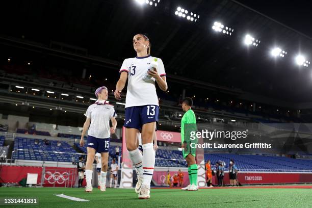 Alex Morgan of Team United States makes their way towards the pitch prior to the Women's Quarter Final match between Netherlands and United States on...