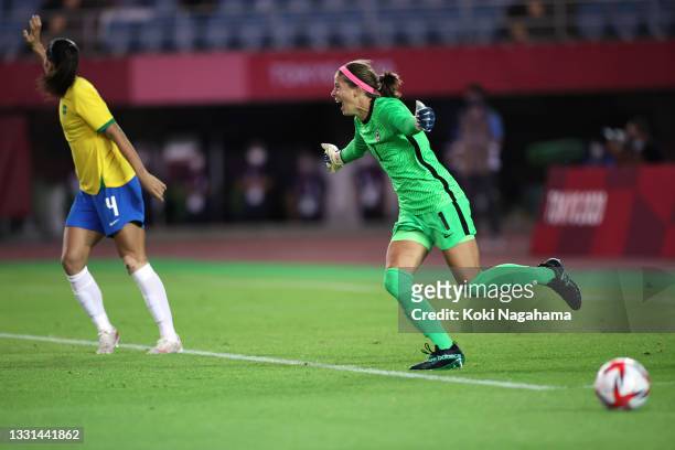 Stephanie Labbe of Team Canada celebrates victory after saving the Team Brazil fifth penalty taken by Rafaelle in a penalty shoot out during the...