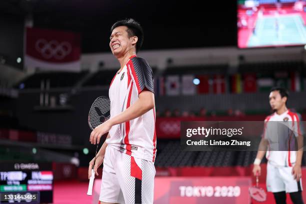 Mohammad Ahsan and Hendra Setiawan of Team Indonesia react as they competes against Lee Yang and Wang Chi-lin of Team Chinese Taipei during a Men’s...