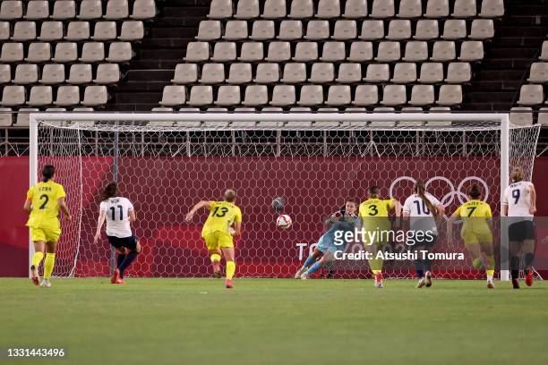 Caroline Weir of Team Great Britain takes a penalty which is saved by Teagan Micah of Team Australia during the Women's Quarter Final match between...