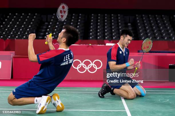 Lee Yang and Wang Chi-lin of Team Chinese Taipei celebrate as they win against Mohammad Ahsan and Hendra Setiawan of Team Indonesia during a Men’s...