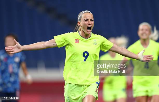 Kosovare Asllani of Team Sweden celebrates after scoring their side's third goal from the penalty spot during the Women's Quarter Final match between...