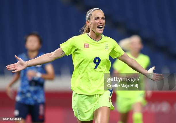 Kosovare Asllani of Team Sweden celebrates after scoring their side's third goal from the penalty spot during the Women's Quarter Final match between...