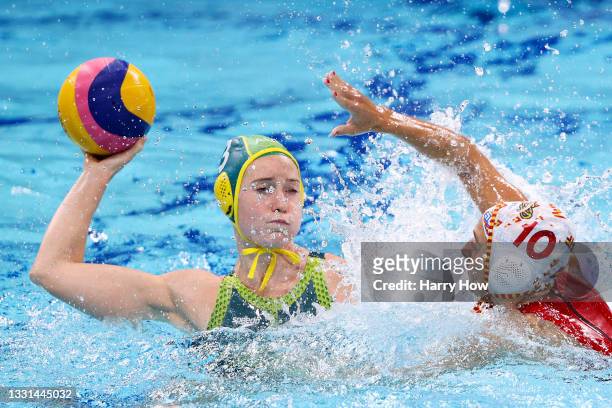 Hannah Buckling of Team Australia is challenged by Roser Tarrago Aymerich of Team Spain during the Women's Preliminary Round Group A match between...